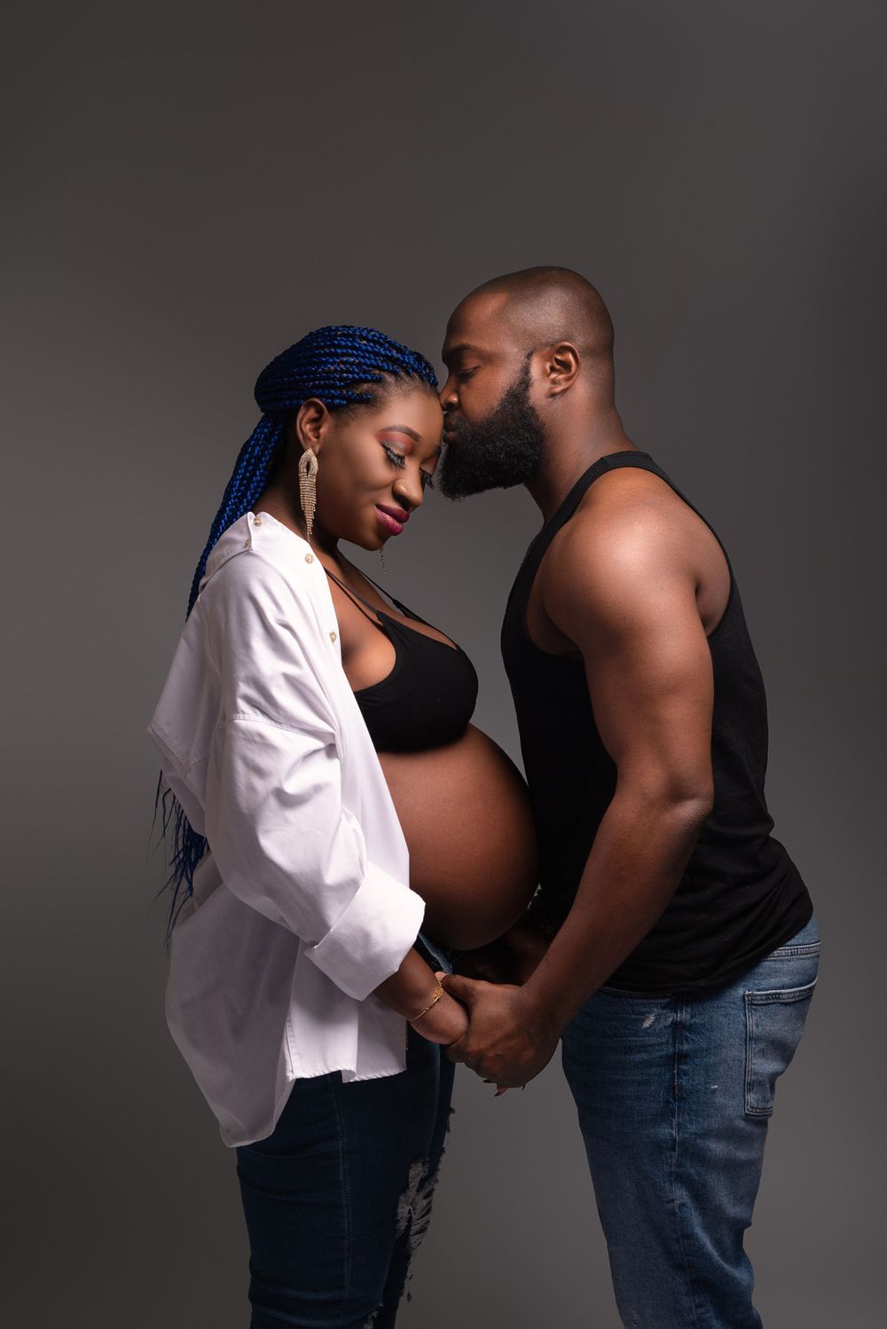 kissing couple maternity session studio photography Wolverhampton