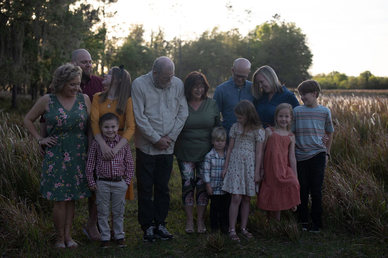 Lakeland Family Photographer- Family posing at sunset