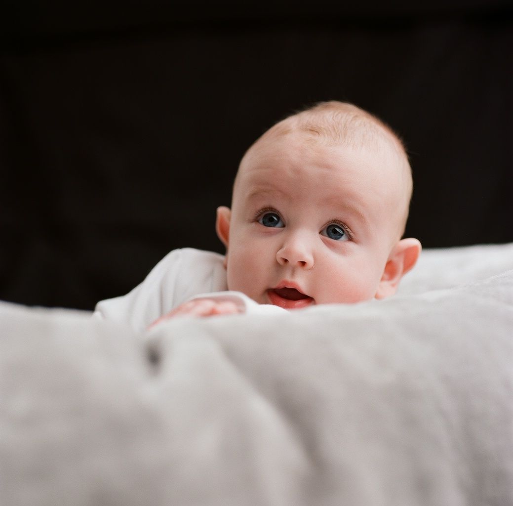 Baby Tommy on a pillow in his Mother and baby studio photoshoot in Derby