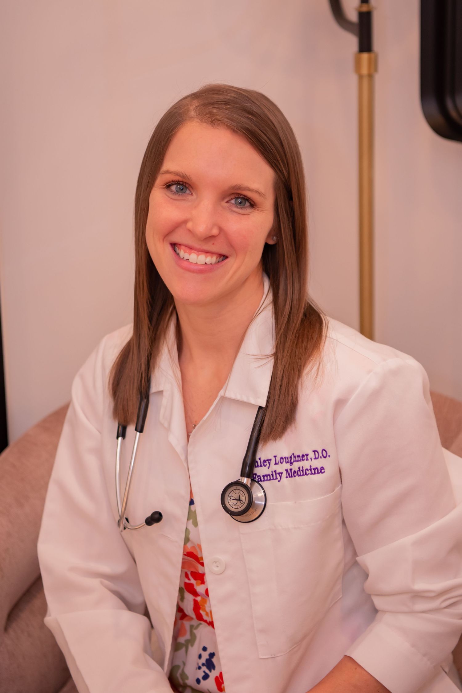 female doctor with white coat and stethoscope ashley loughner