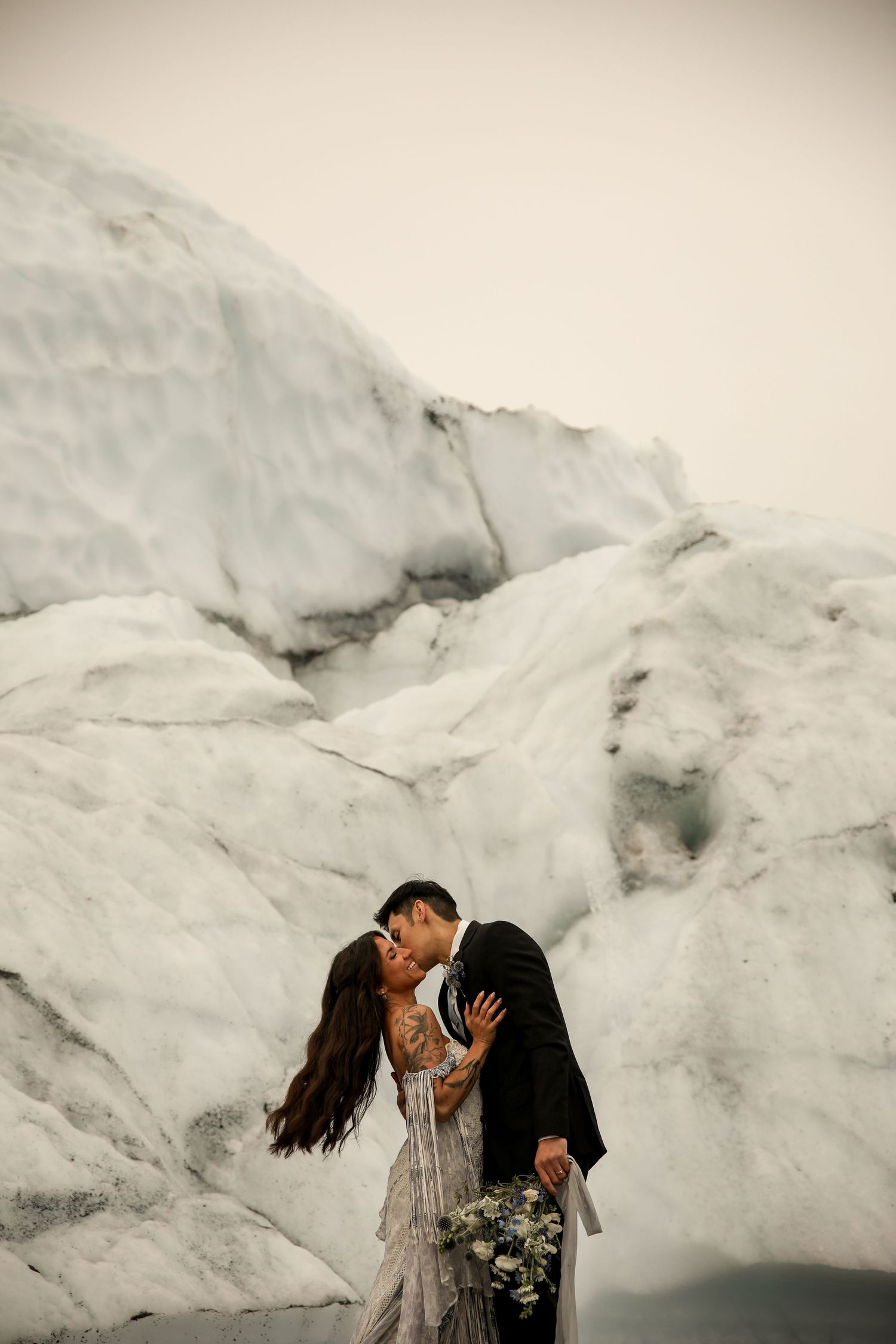 First kiss glacier elopement, alaska wedding photographer