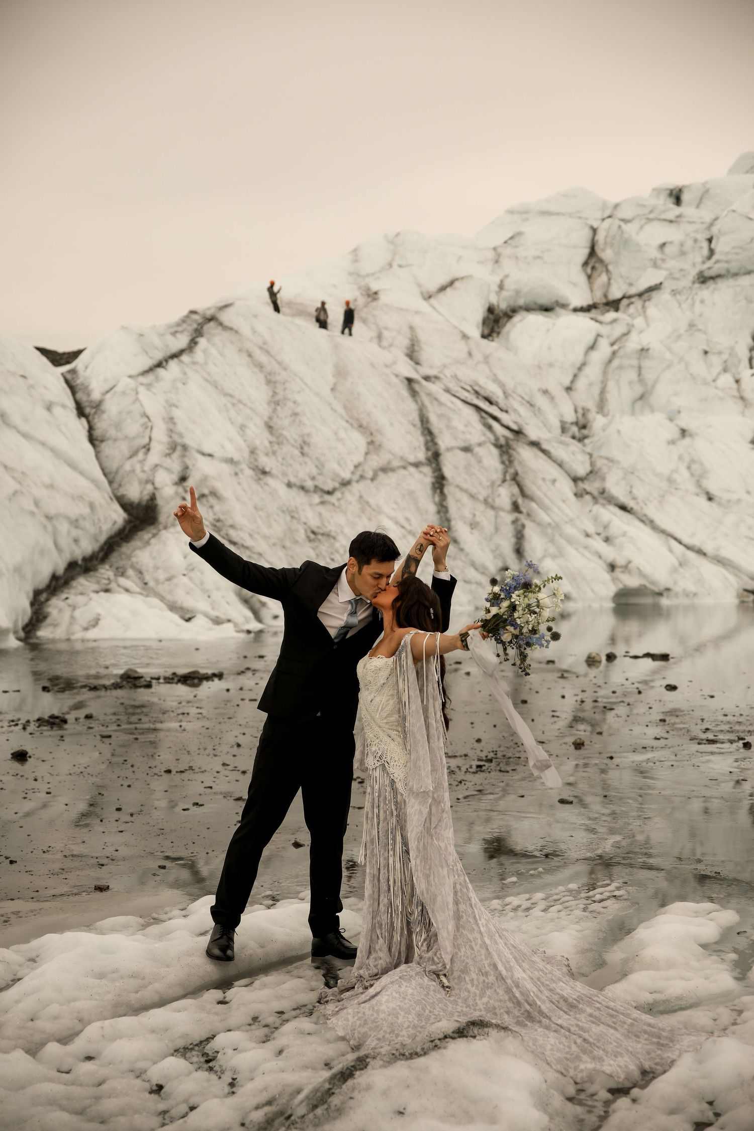 Alaska wedding photographer: celebration kiss