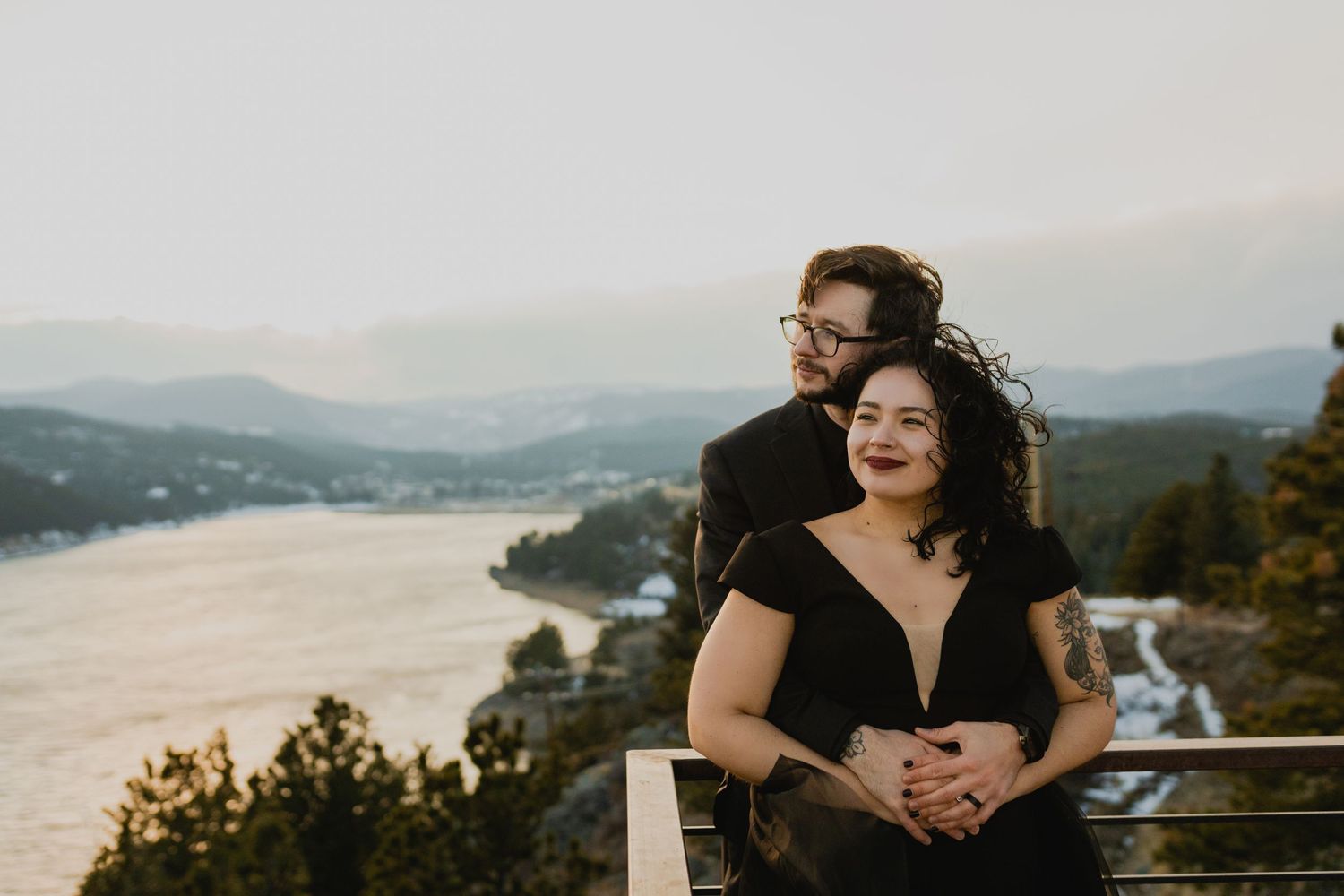 Elopement photographer skillfully documenting a couple's special day, with Colorado's natural wonders as the enchanting