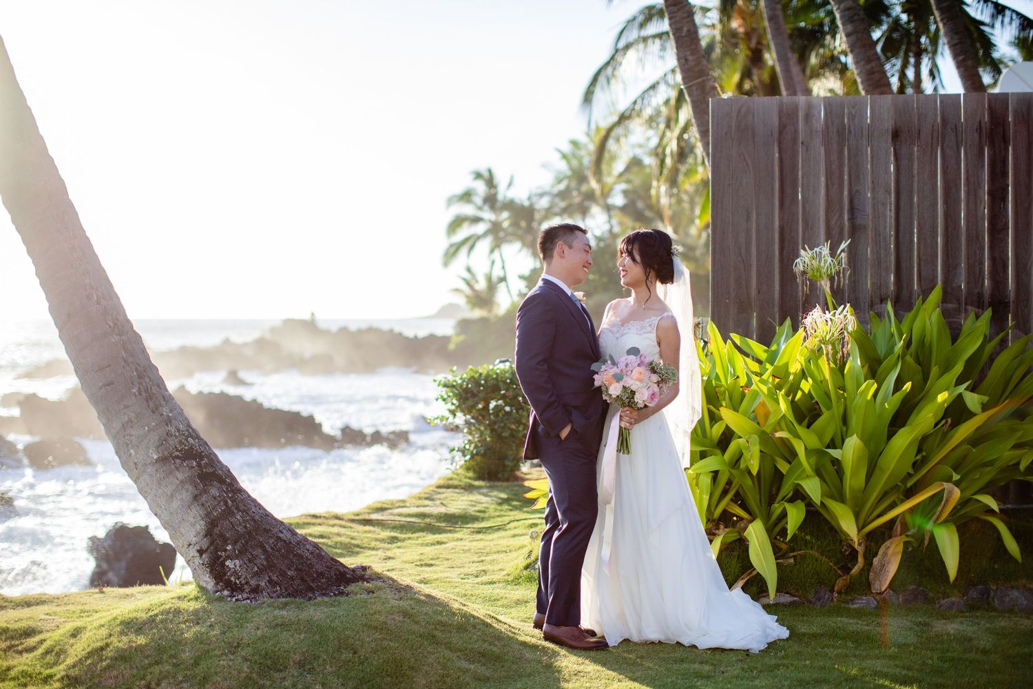 An elegant Hawaii wedding at White Orchid Beach House in Makena, Maui. Wedding photographer, Aihara Visuals.