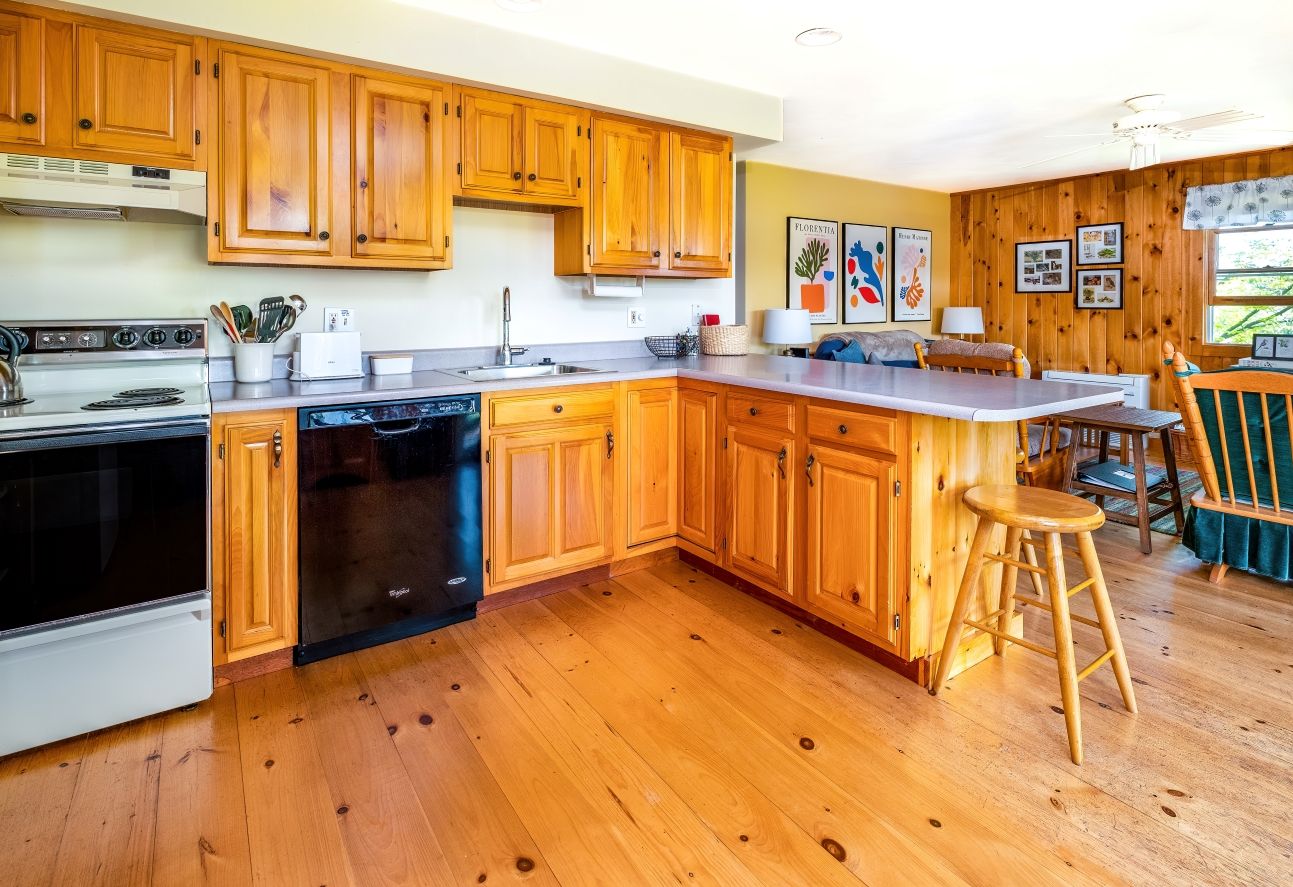 A photo of a kitchen and living room at an Air B and B Property in Jefferson, Maine.