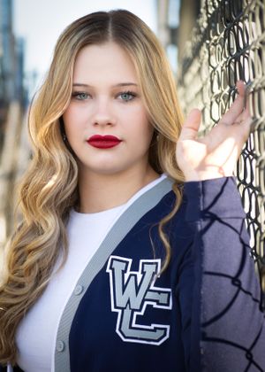Studio portrait showing varsity letterman jacket with WC logo. Senior Photographer Batavia Cincinnati Ohio