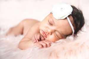 Posed newborn baby girl