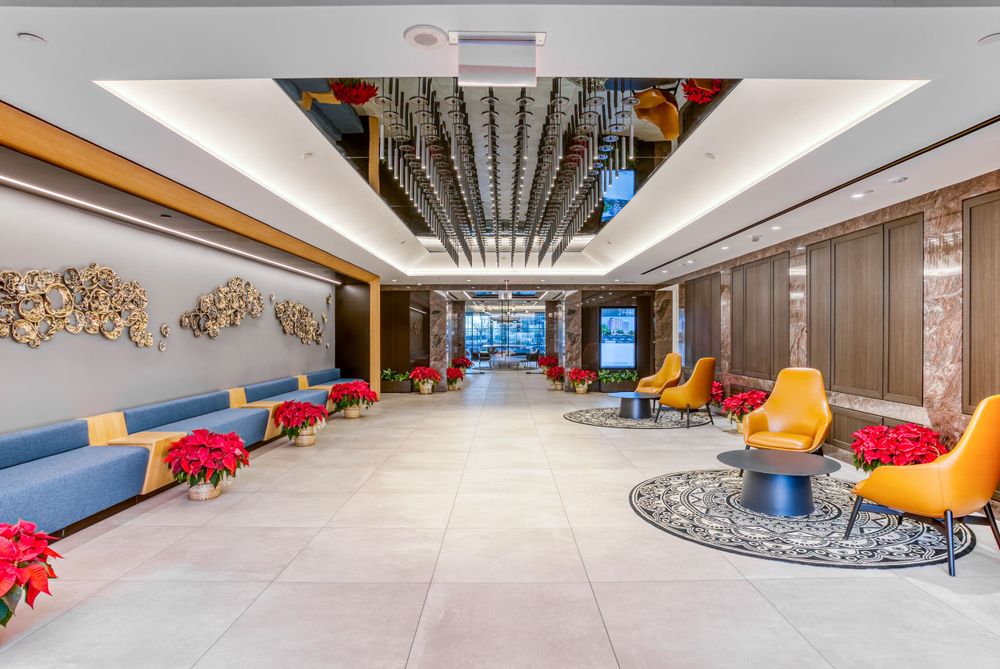 Stylish office lobby with colorful seating areas and modern architectural details.