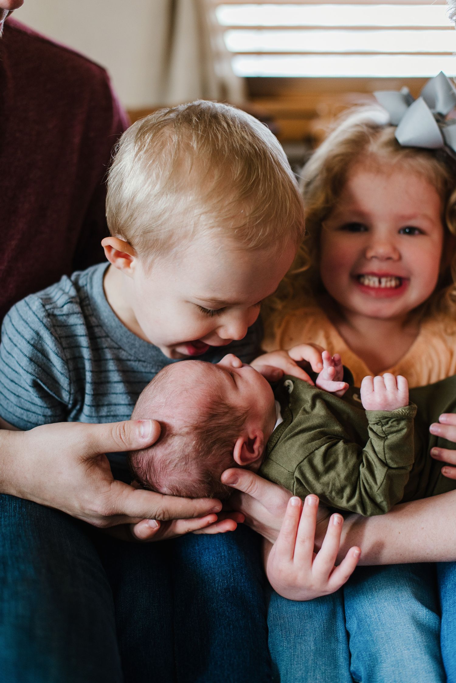 In-home lifestyle newborn family photo session by Wichita photographer