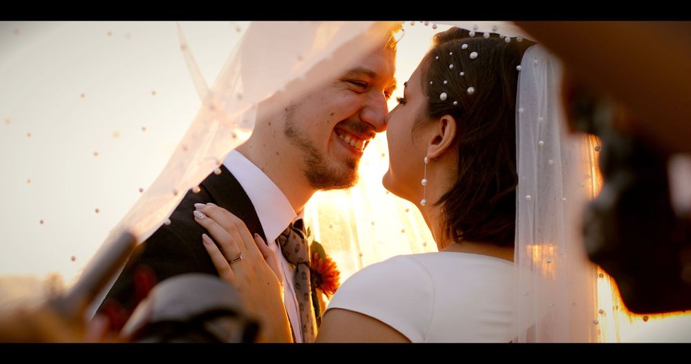 Wedding Photography Behind the Scenes Photographer taking Wedding Photos Bride and Groom Under Veil