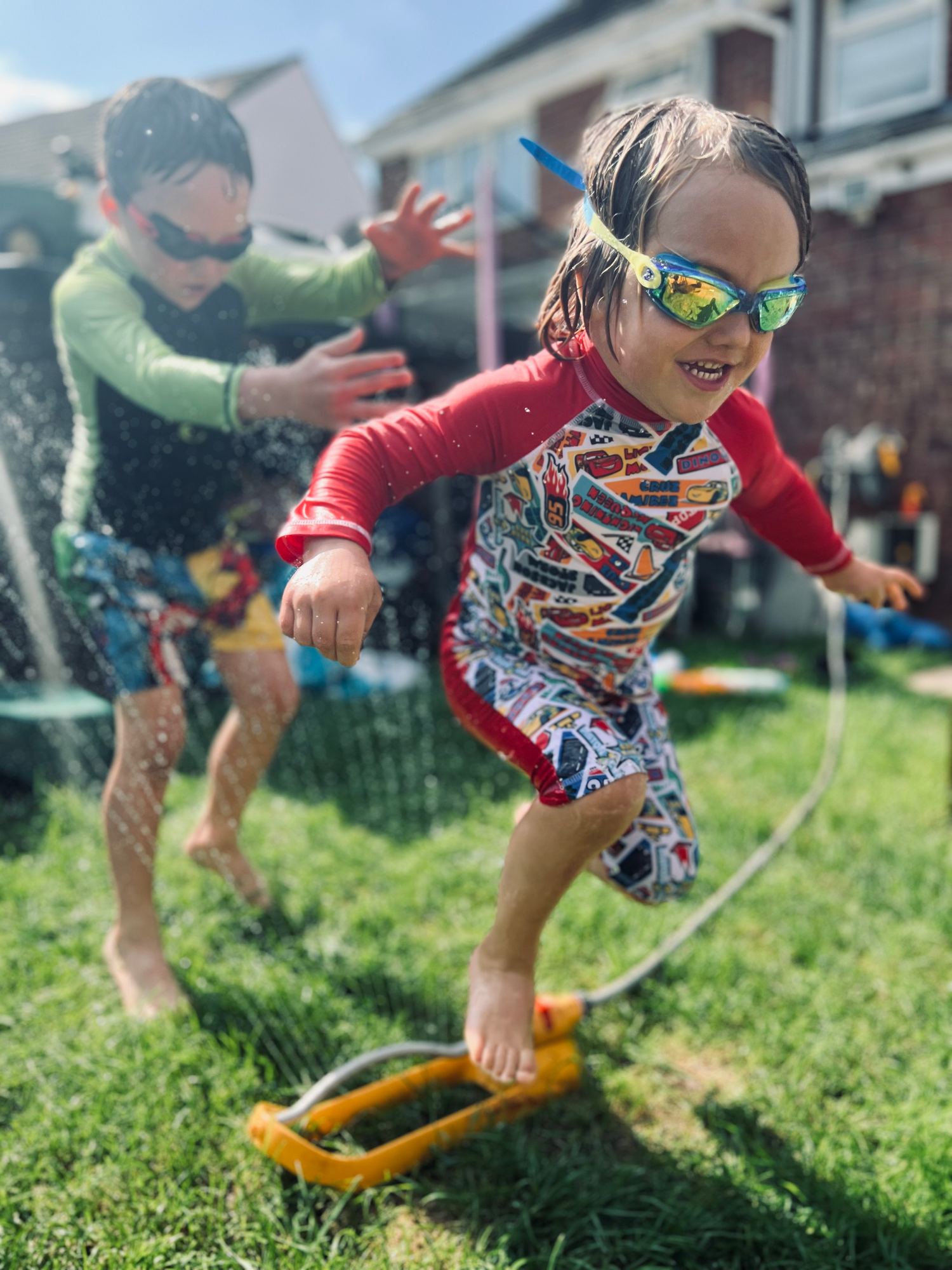 Running through sprinkler