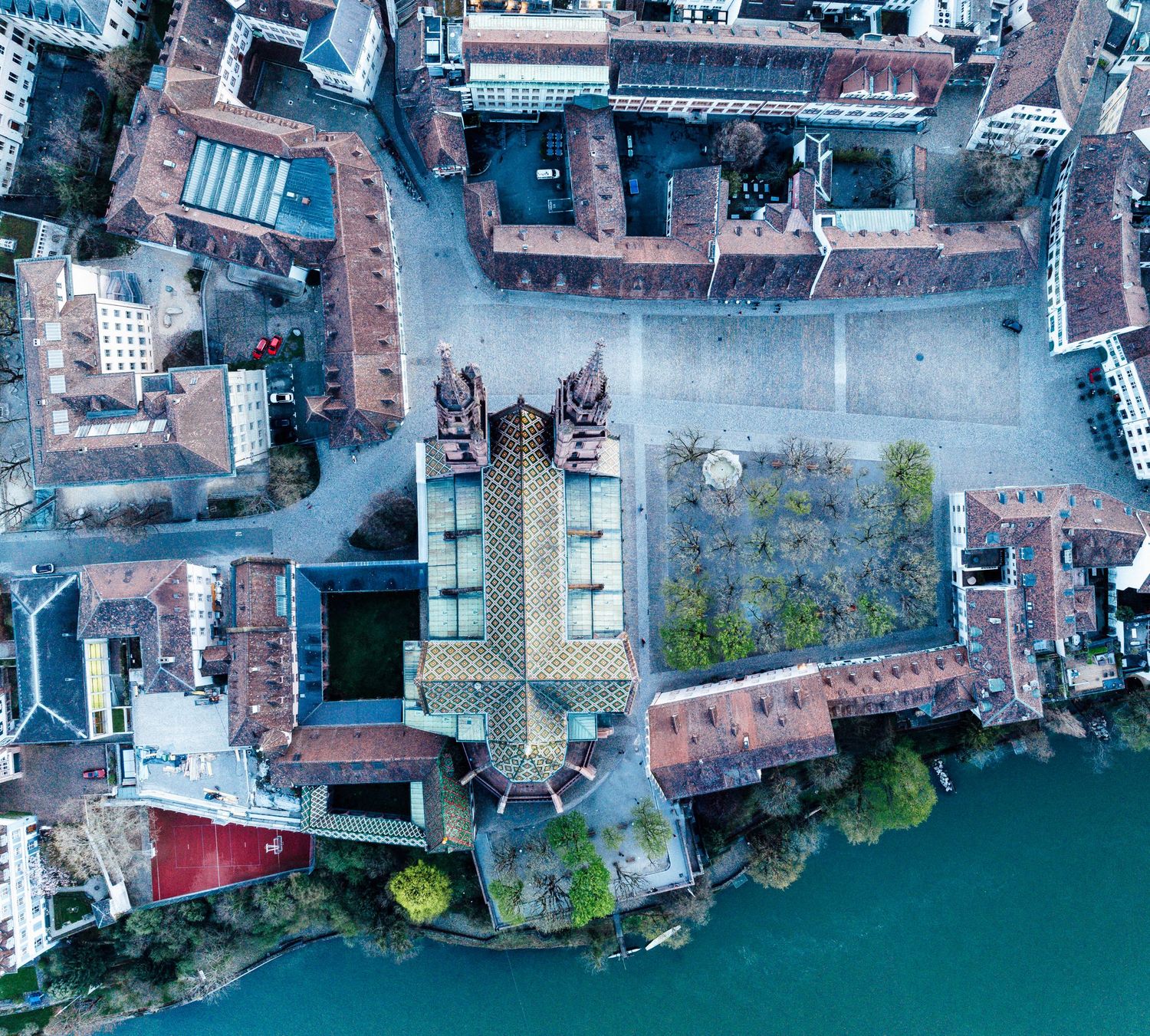 Bird's eye view of urban buildings and waterways showing detailed architectural layout.