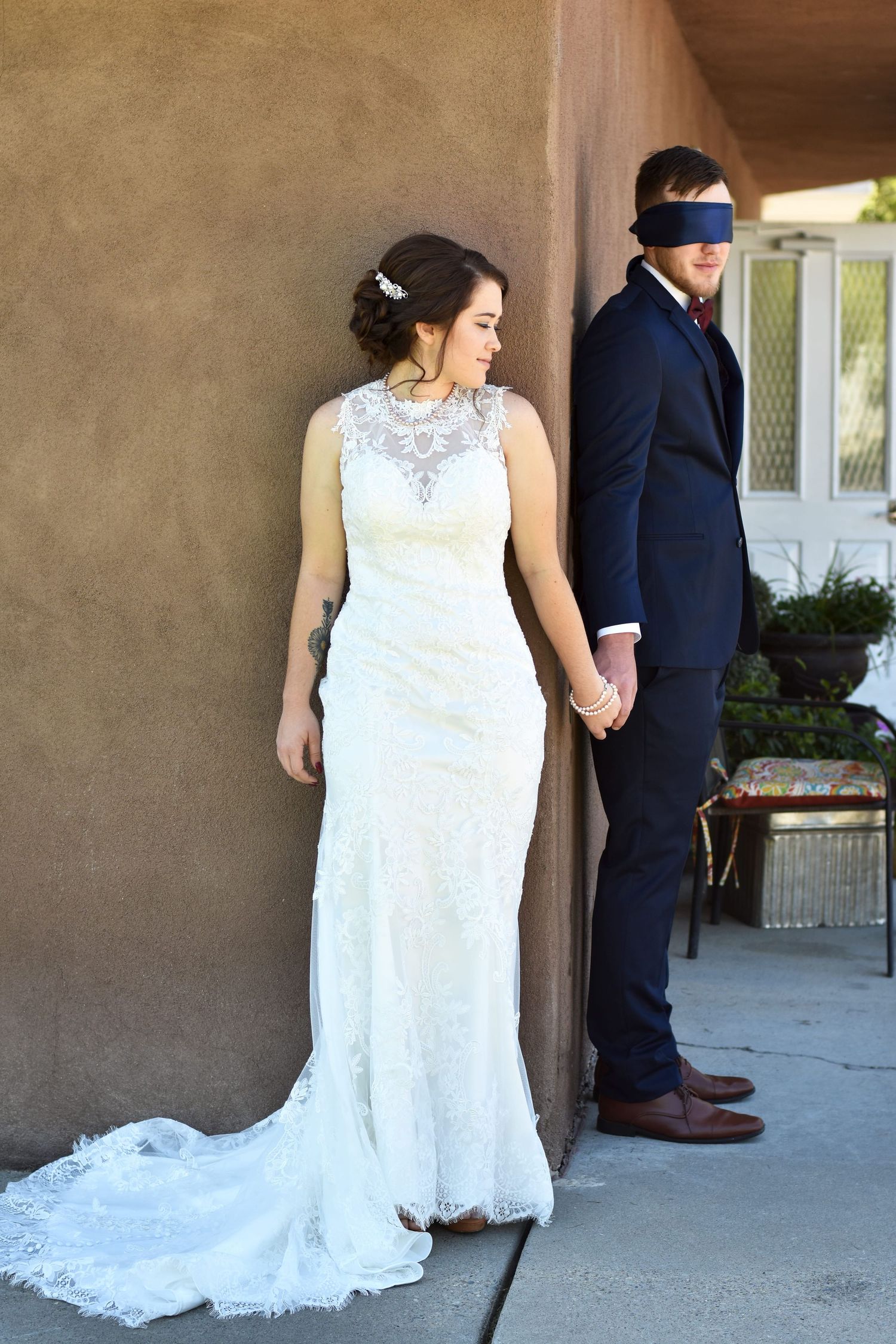 Wedding couple holding hands
