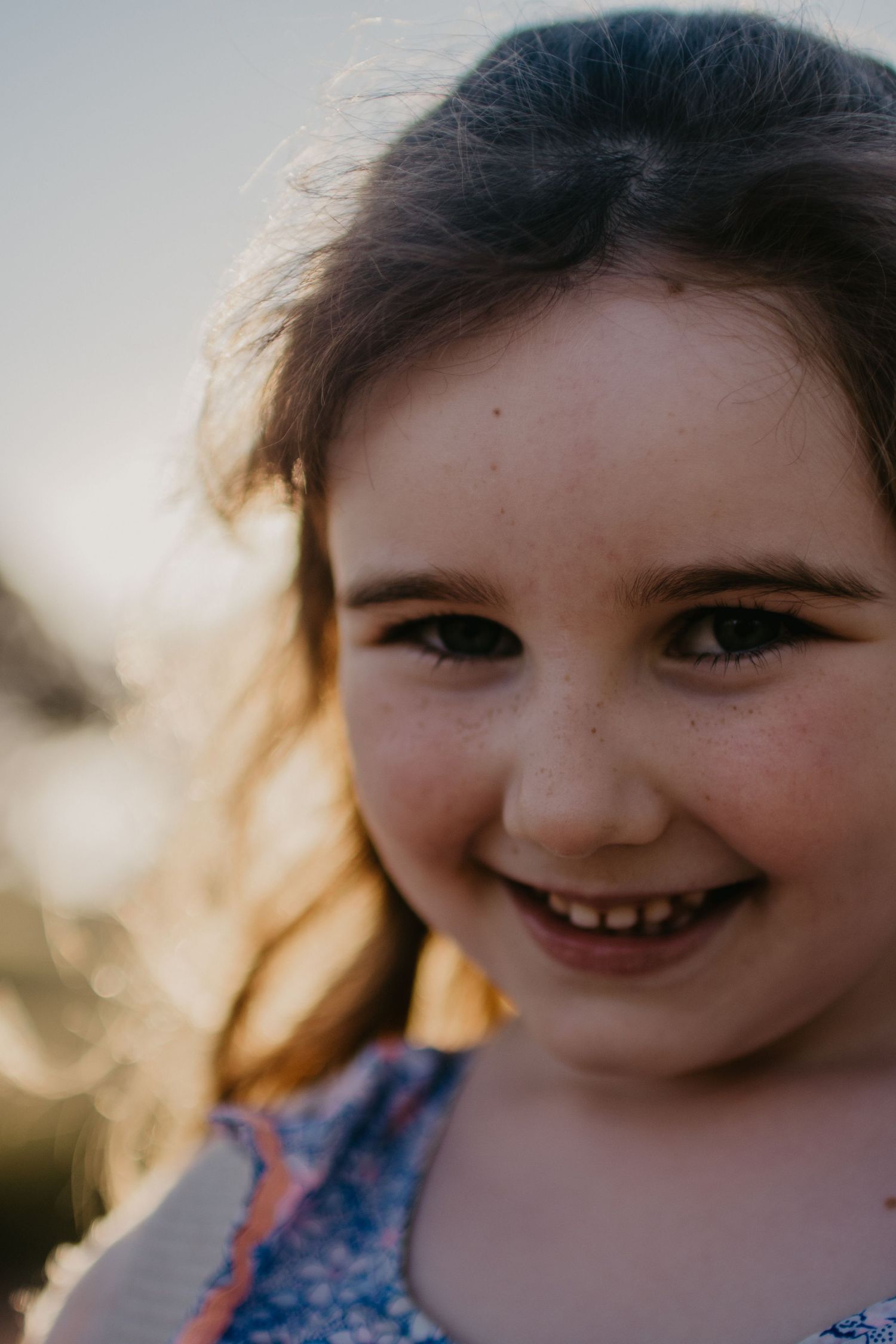 smiling girl in the golden haze