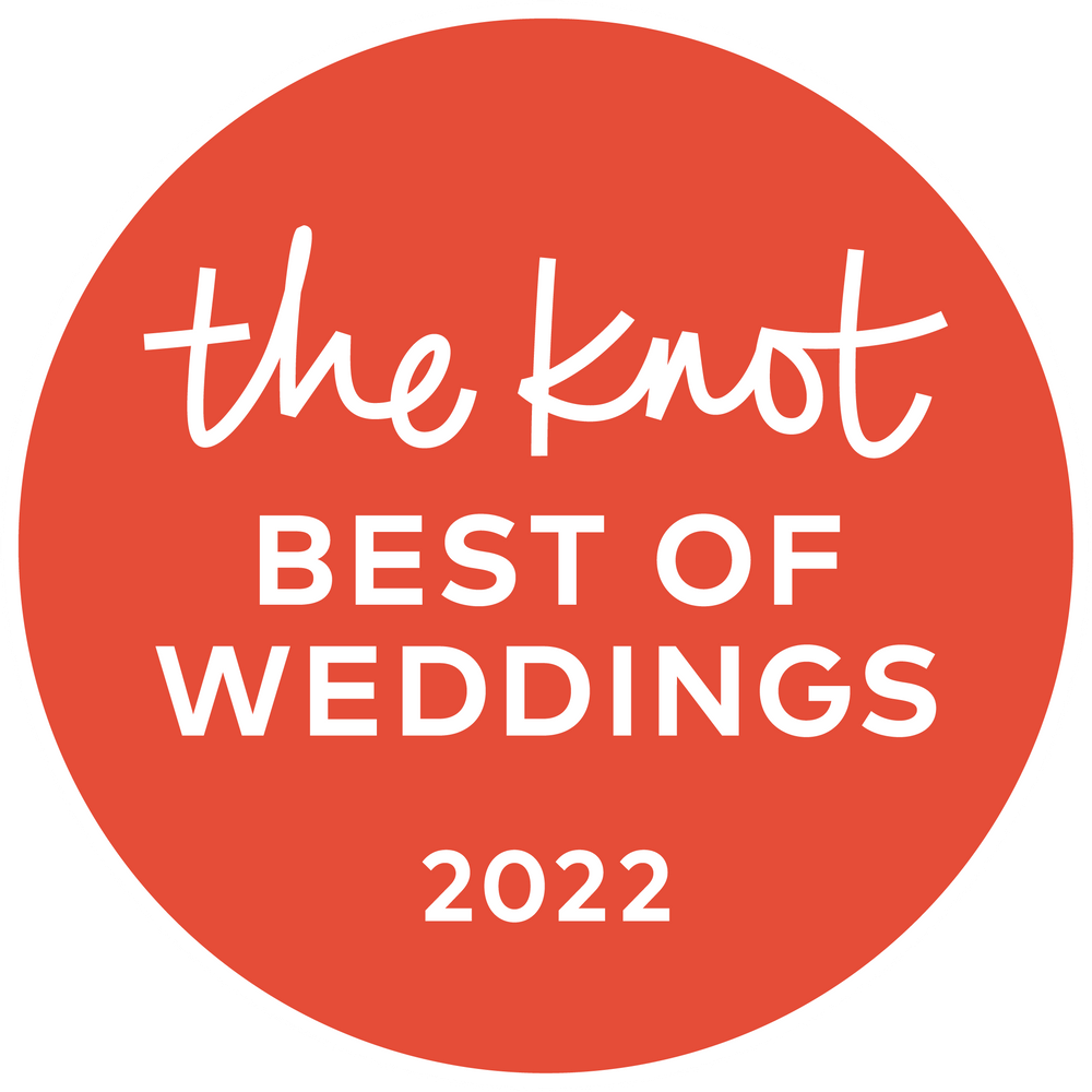 The Knot Best of Weddings 2022 award badge in coral red circle.