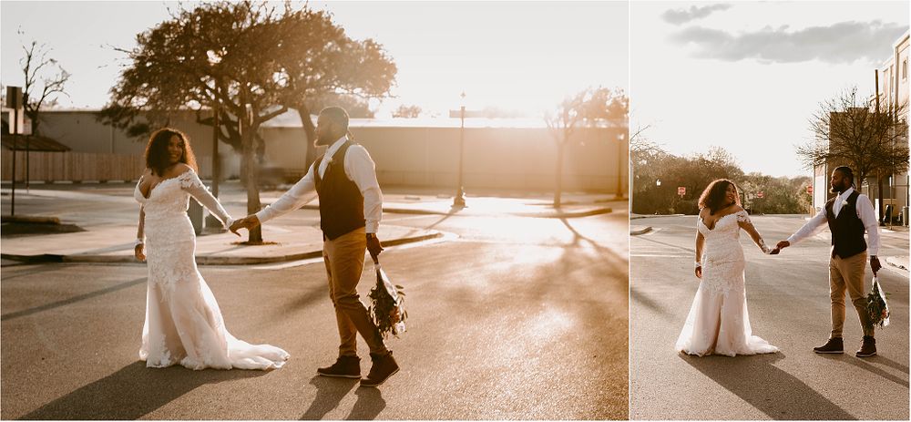 A wedding couple dances and twirls in the golden sunlight on an empty street.