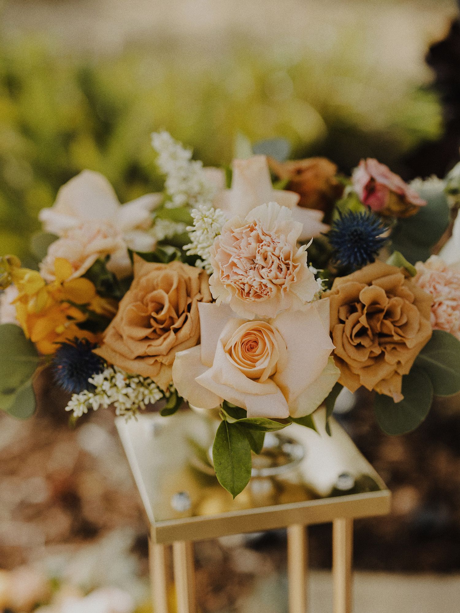 E Noelle Photography in-home wedding in Hidden Hills Los Angeles, bridal orange, pink, and white floral bouquet