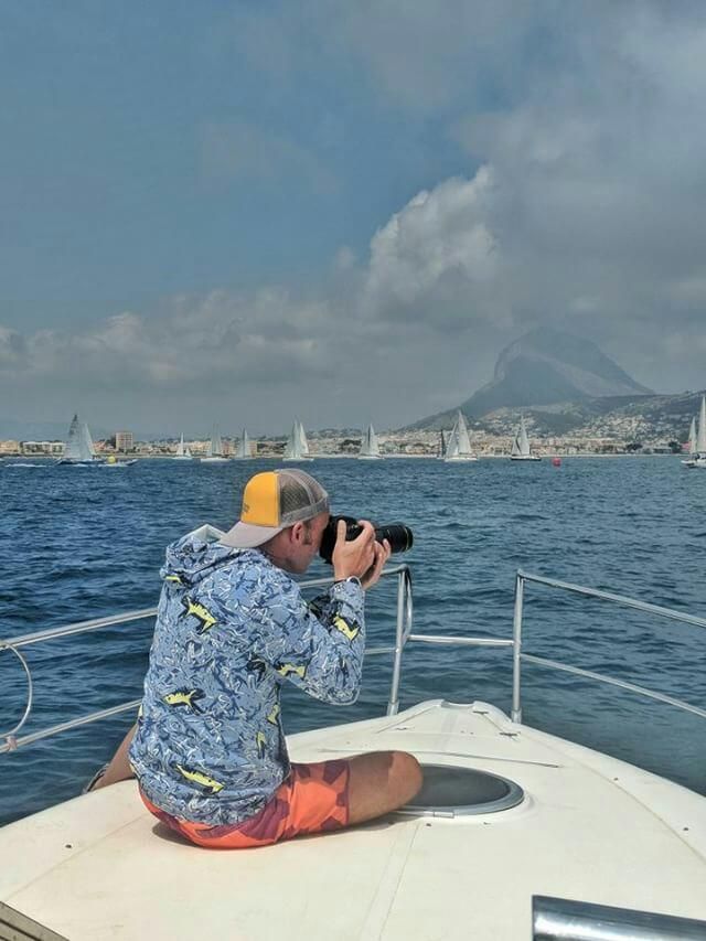 Eye Sea you shooting a sailing regatta from a motor boat