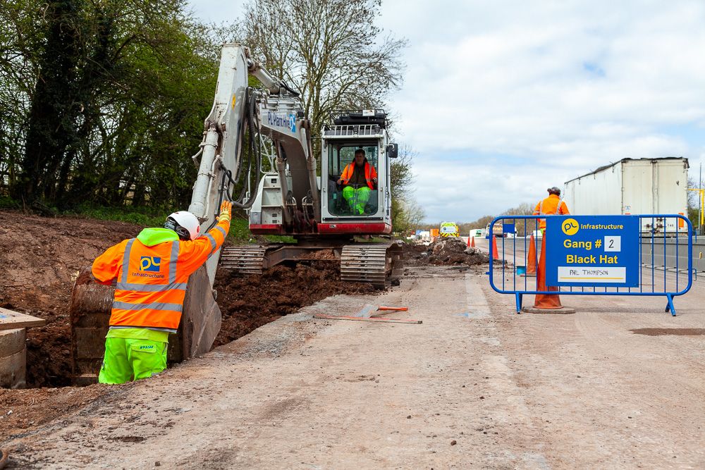 Ground works civil engineering M6 Smart Motorways digging a trench