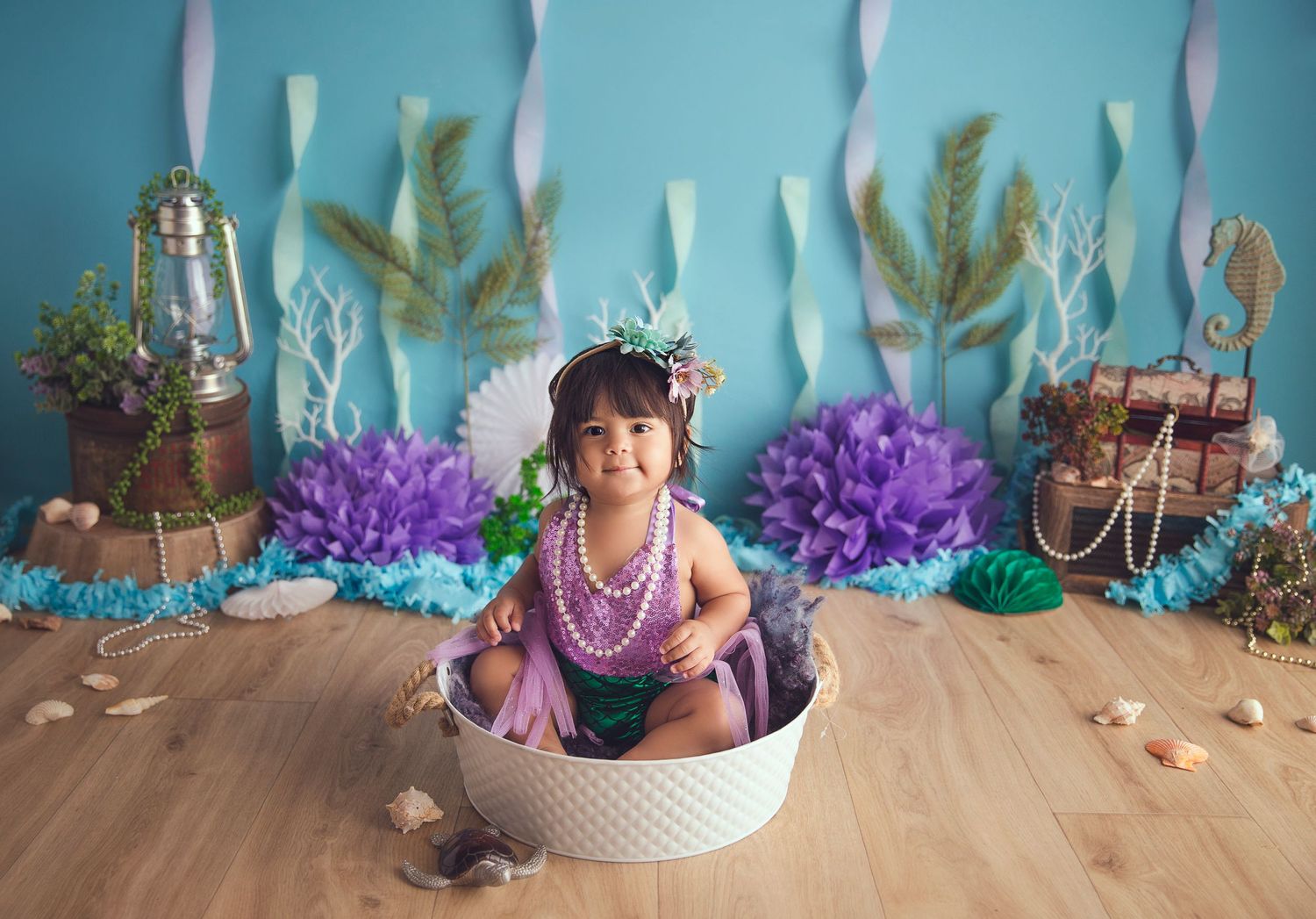 baby in tin bowl mermaid themed session treasure in the back
