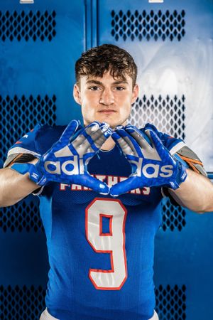 young man in football gear