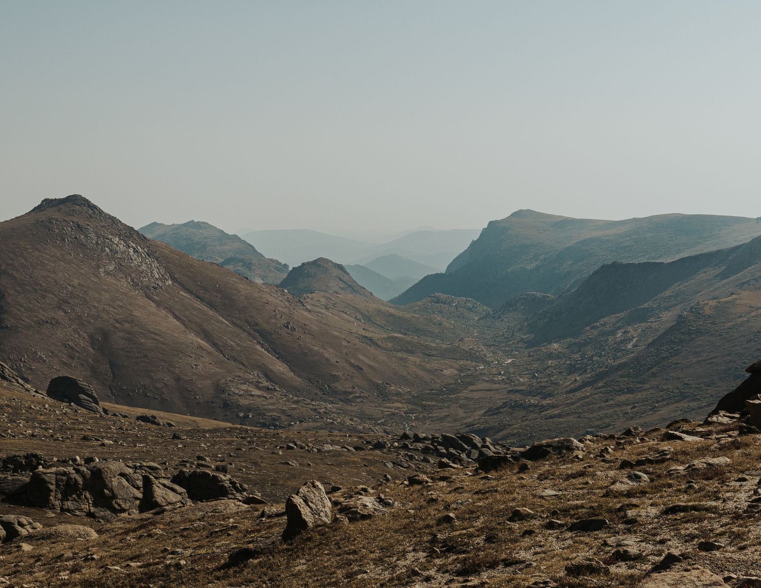 a mountainous valley with an expansive view