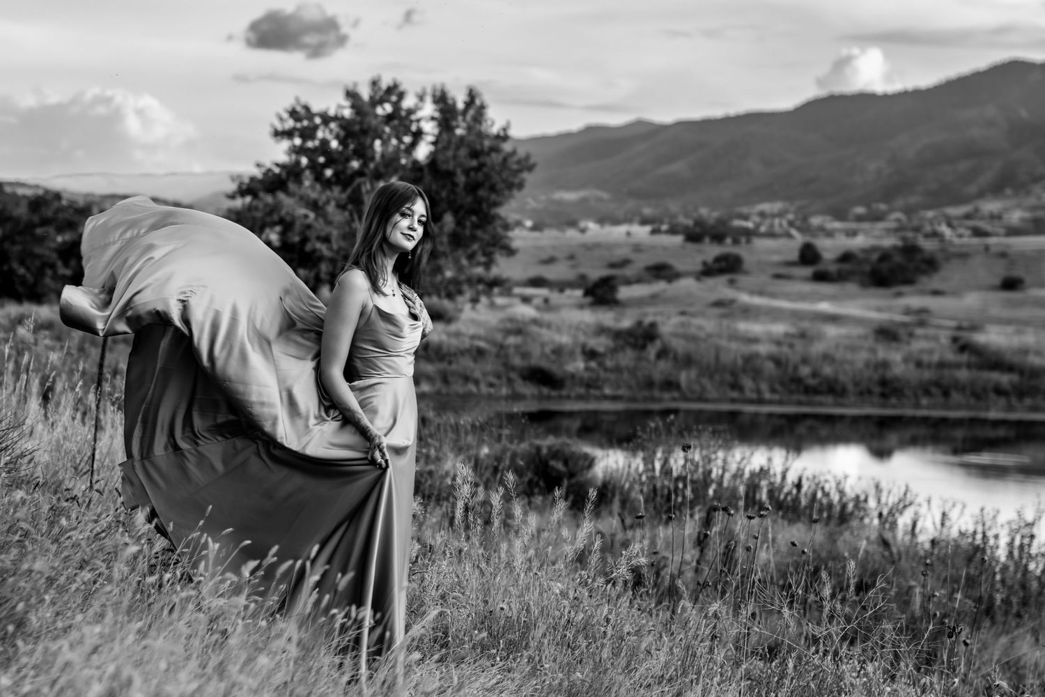 High school senior girl in a parachute dress in front of the South Valley Park pond
