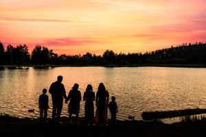 Silhouette of a family overlooking O'Haver Lake near Salida, Colorado.
