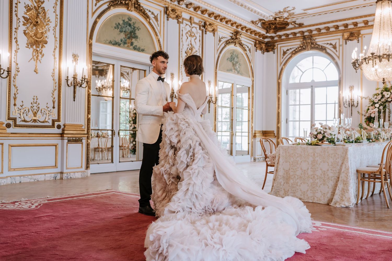 Bride and groom look at each other while dancing in the Music Room at the Elkins Estate.