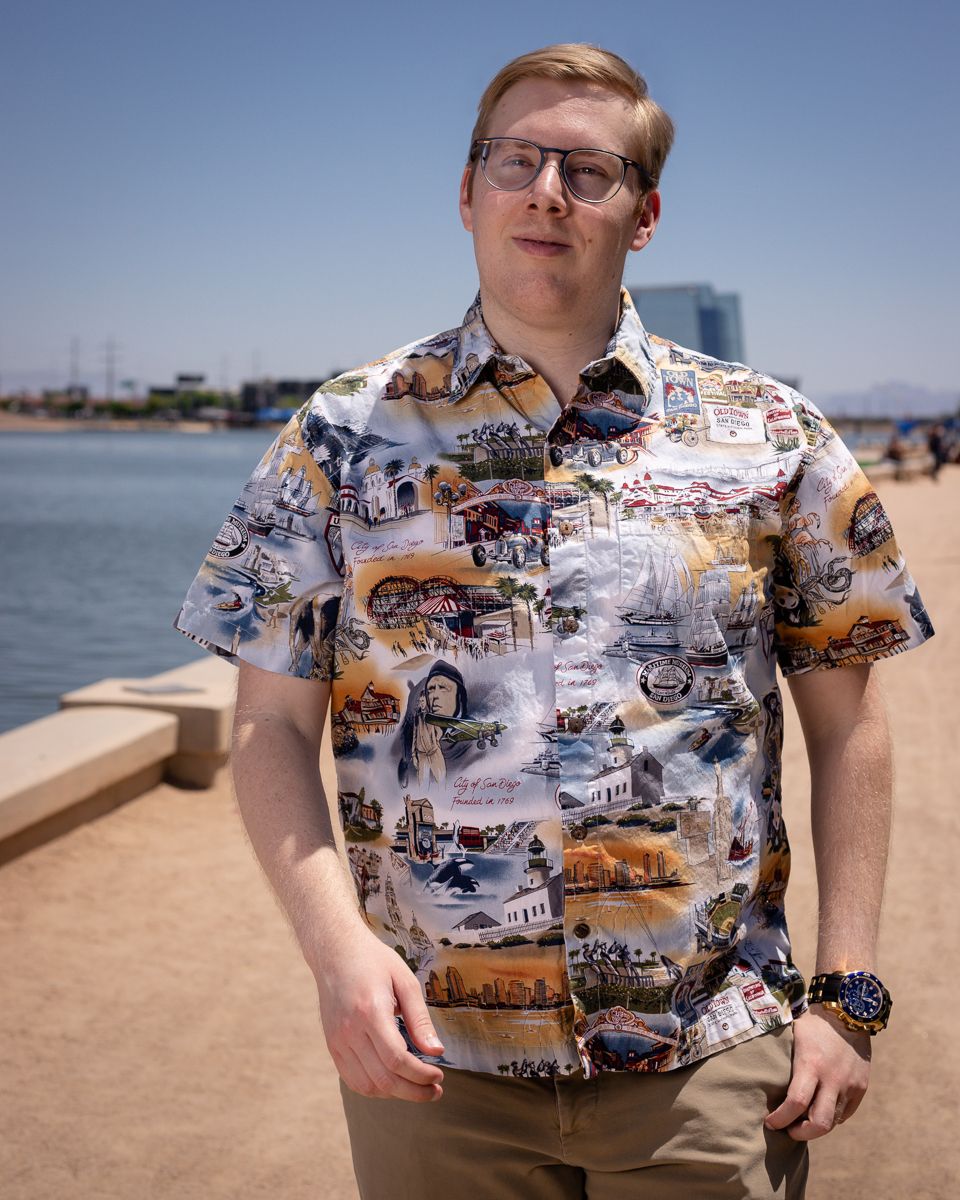 mid-20's man walking at Tempe Town Lake in Tempe, Arizona
