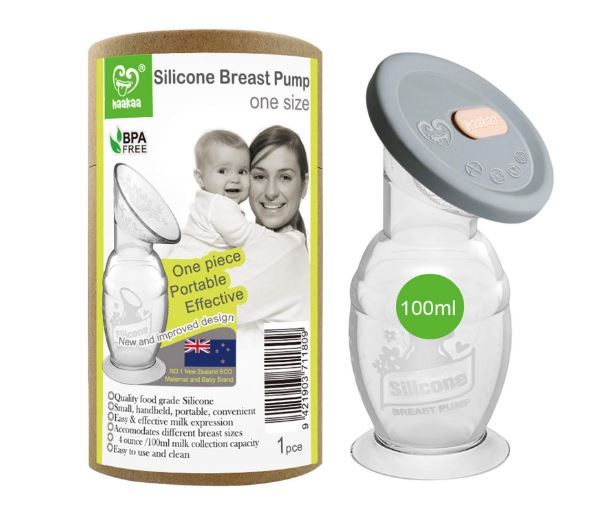 Silicone breast pump with 100ml capacity and packaging showing product details.