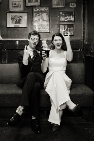 Cosy pub photoshoot in Dublin in Ireland for a couple during their intimate wedding.