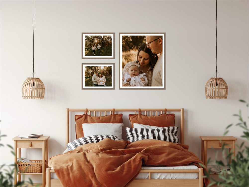Minimalist bedroom interior with photo gallery wall and natural wood accents.
