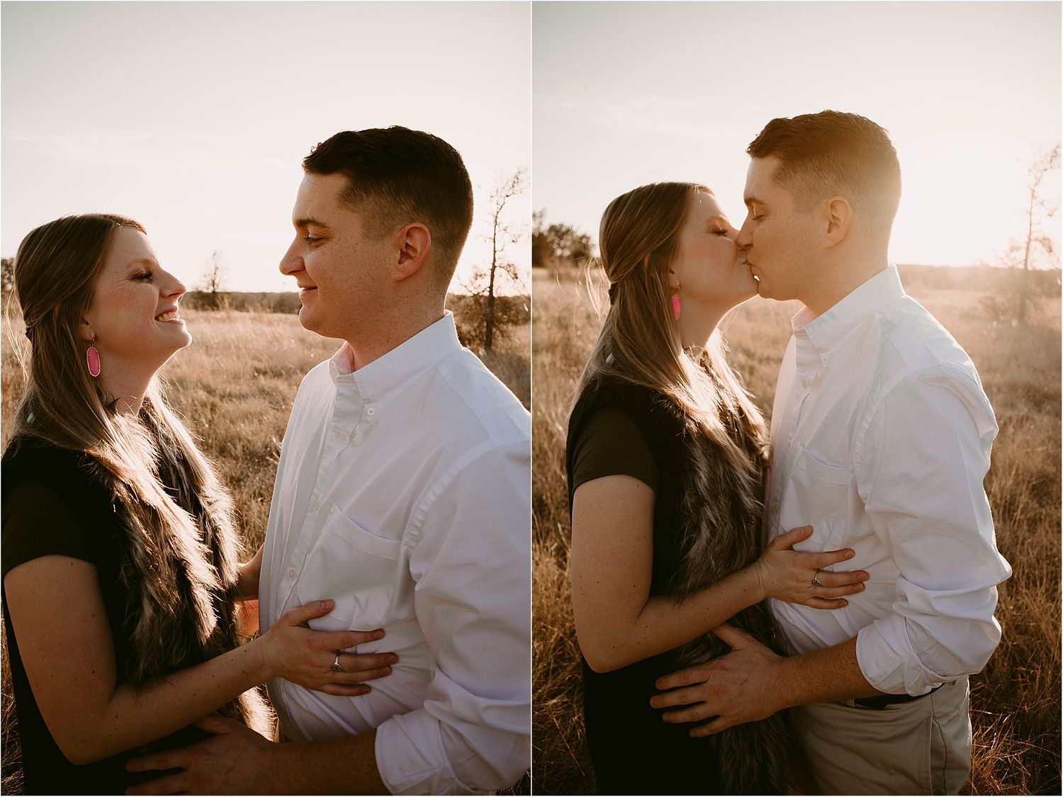 Romantic couple embraces in warm sunset light in rustic field setting.