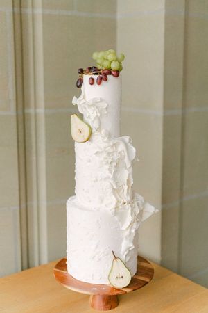 Wedding cake with multiple tiers and fruit decoration at Schloss Schadau Thun.