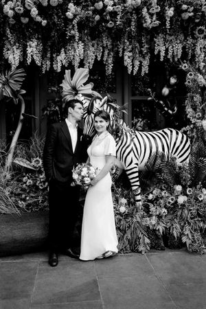 The bride, the groom and the Zebra at their Chelsea Town Hall wedding in London. London wedding photographer