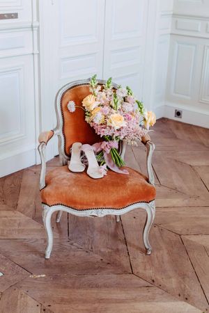 Wedding bouquet on a chair at a destination wedding in the south of France. Destination photographer UK, France, Switzerland, Spain, Italy