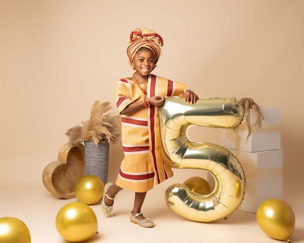 girl child birthday portrait photo in traditional outfit