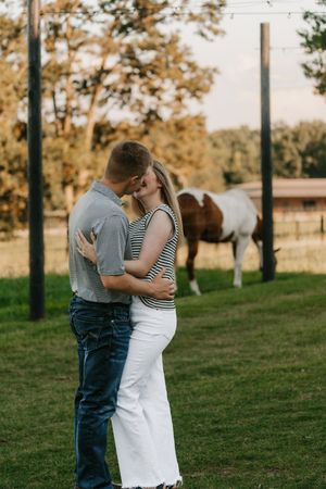 engagement session on a working cattle, horse farm, Milan, TN. West Tennessee,