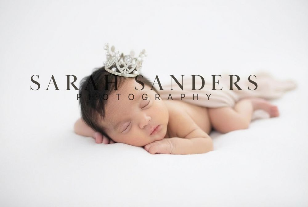 Newborn baby in belly froggy pose