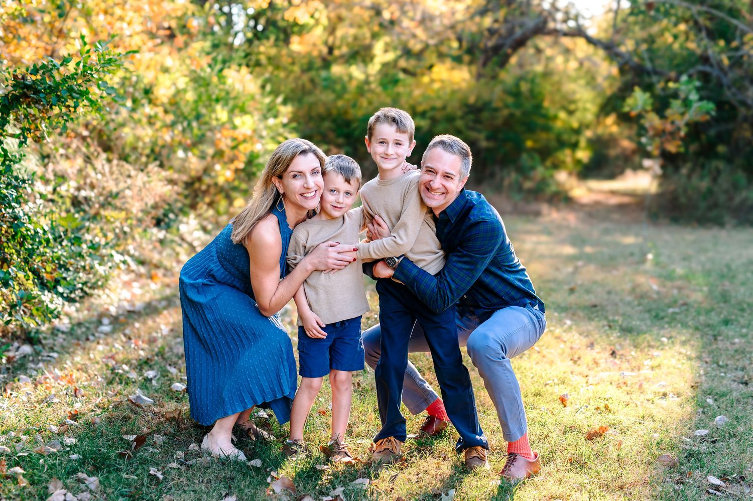 Family with 2 sons at Coal Creek Farm in Jenks Oklahoma fall photos in Tulsa area