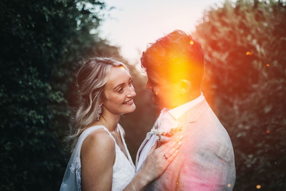 unique wedding portrait of couple with film burn across the lens