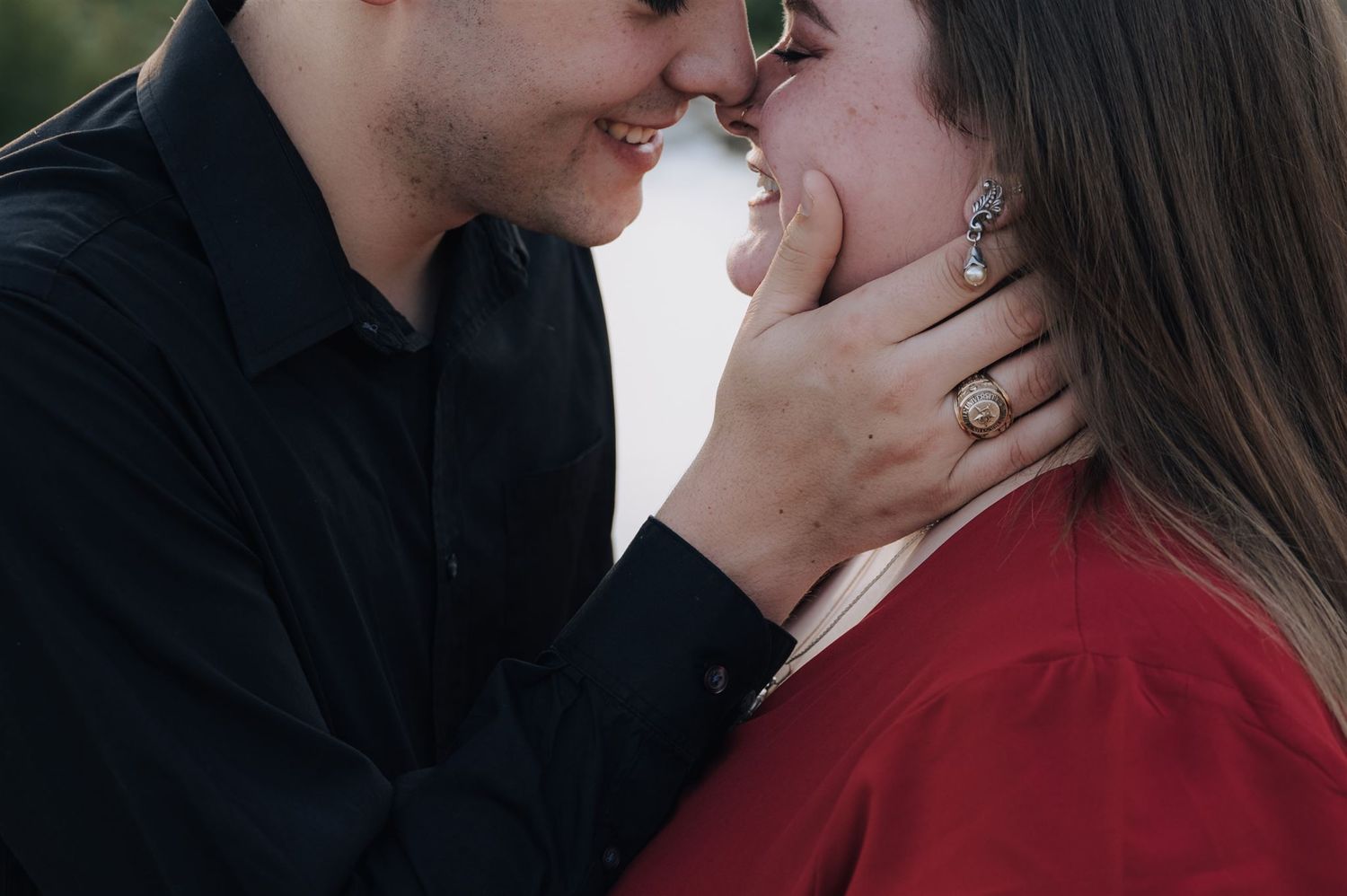 An intimate close-up moment between a couple with gentle touching.