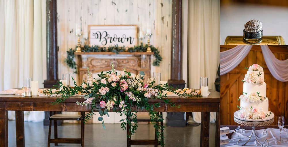 Wedding reception table styling with floral centerpiece and illuminated cake display.