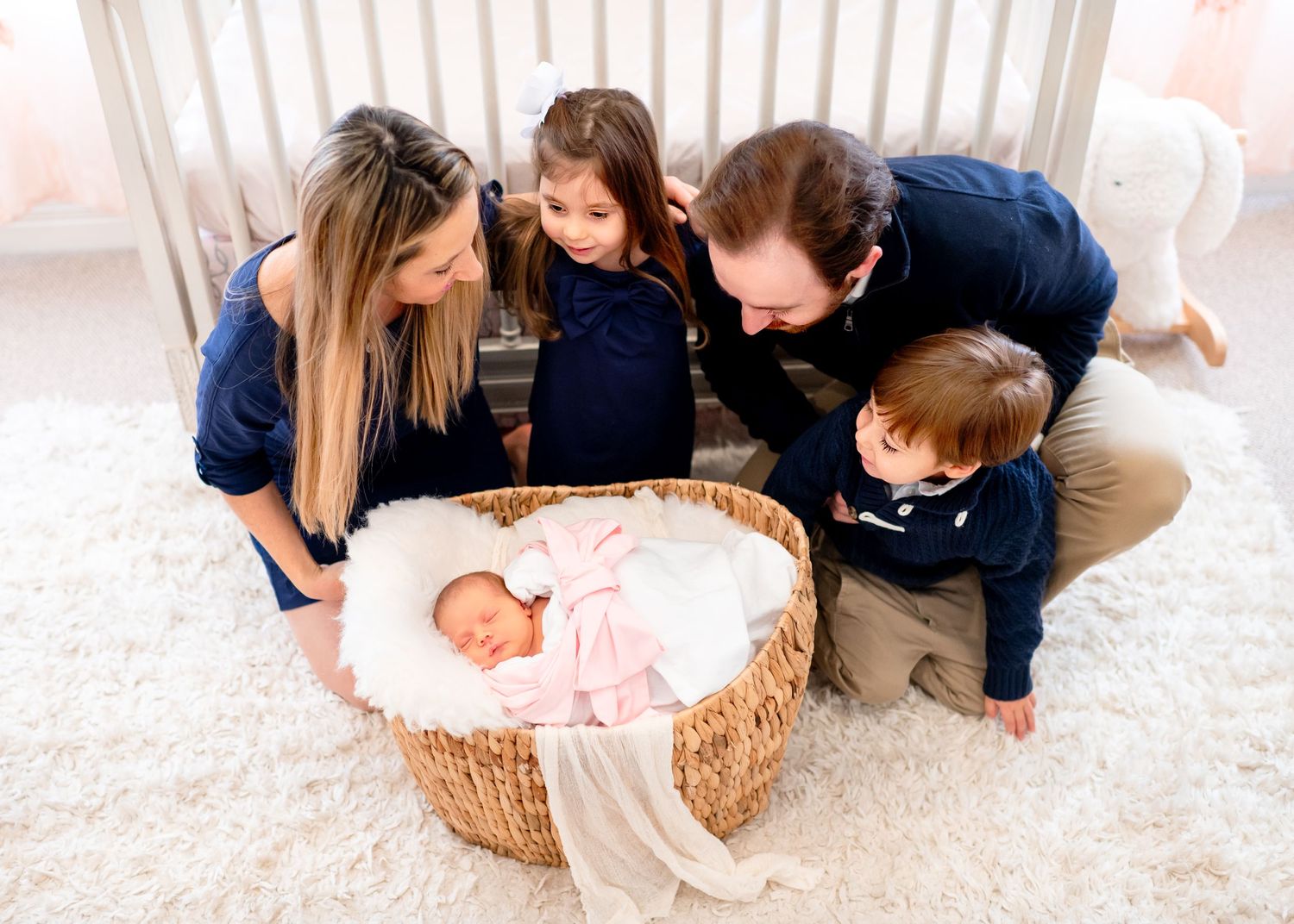 family of five taking in home newborn lifestyle portraits in west university in houston texas