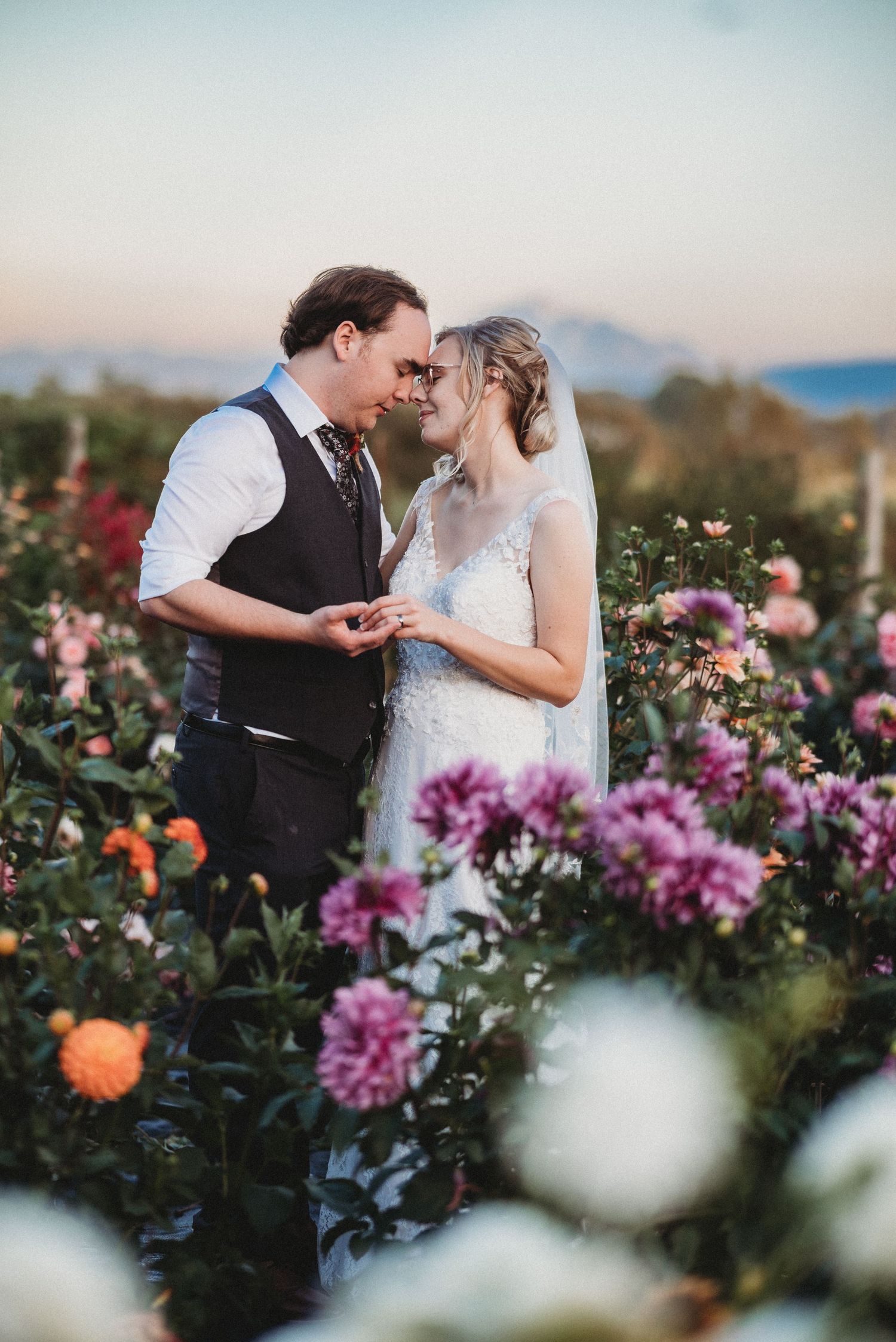 couple in dahlia field at barnstar events ferndale