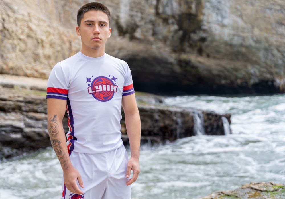 Young man radiating confidence and style, modeling his captivating lifestyle brand in a beach photoshoot