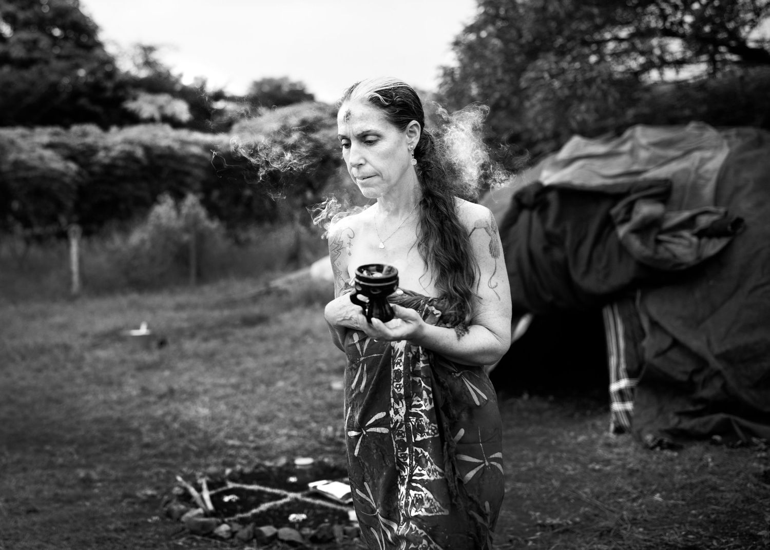 woman with sacred smoke in ceremony in costa rica
