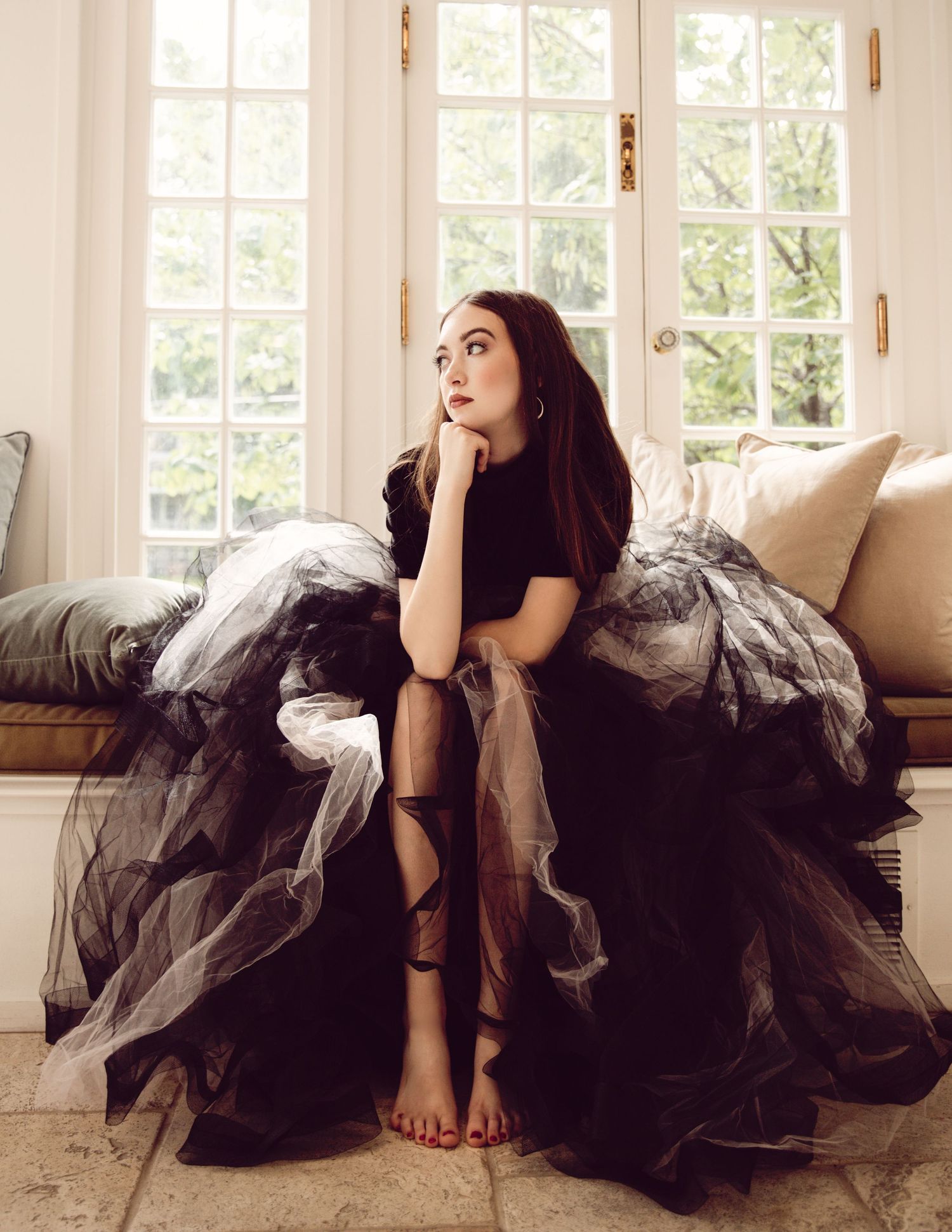 Luxury senior photoshoot at Kansas City mansion in puffy tulle dress