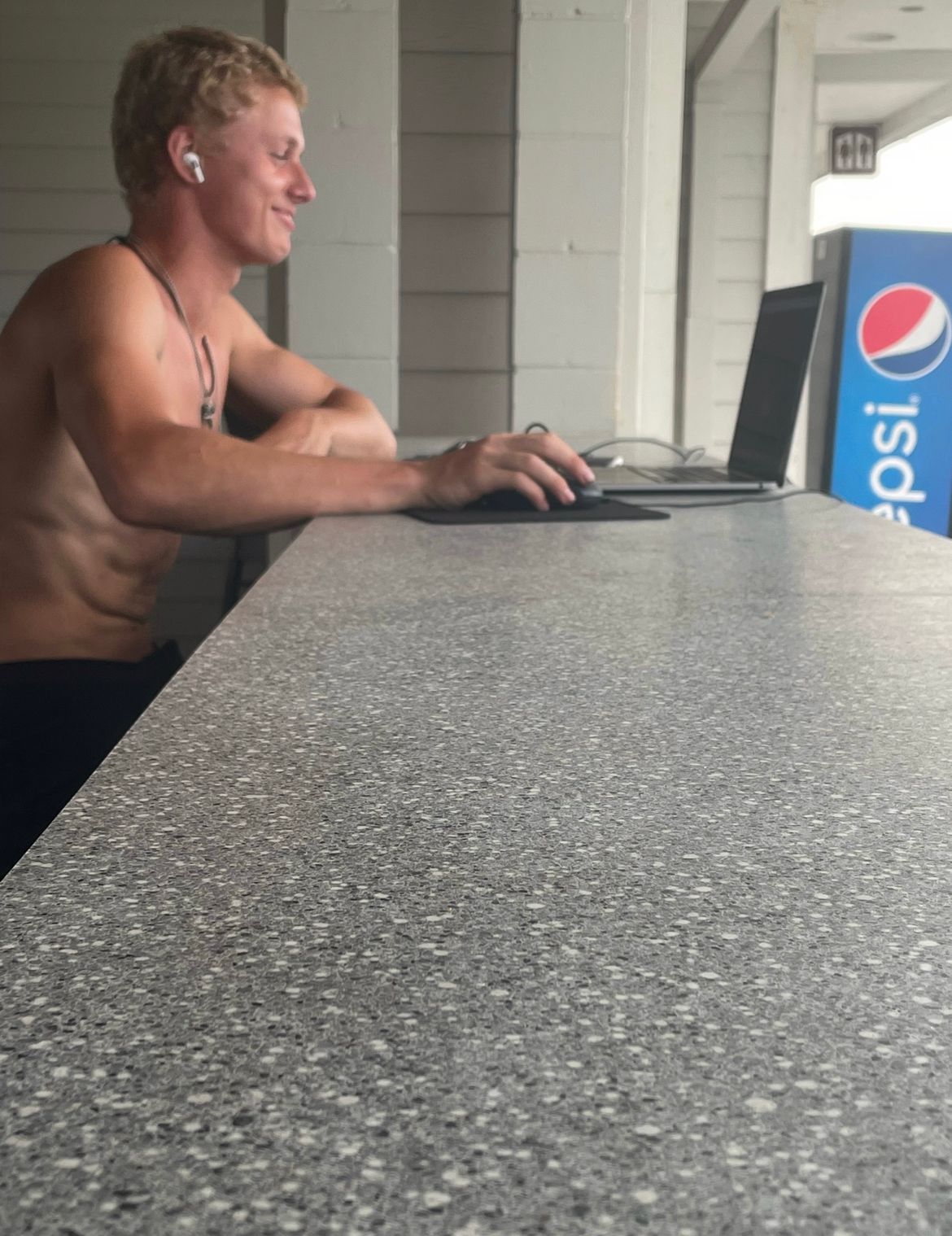 Brennan hard at work at the beach shops (he's a roblox 3D modeler)